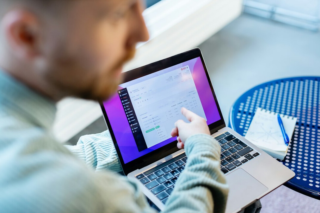 person learning to code on laptop