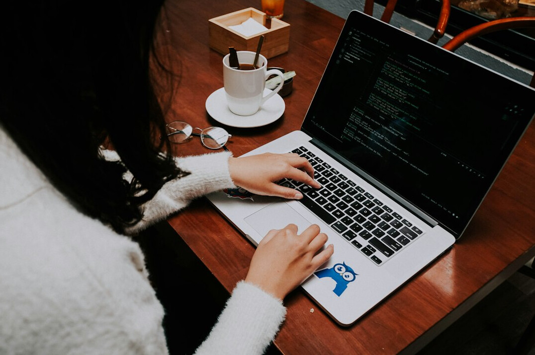 woman writing code