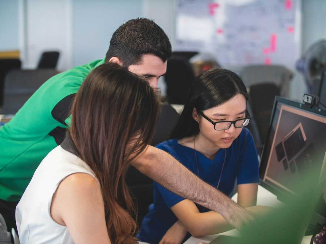 group of programmers collaborating